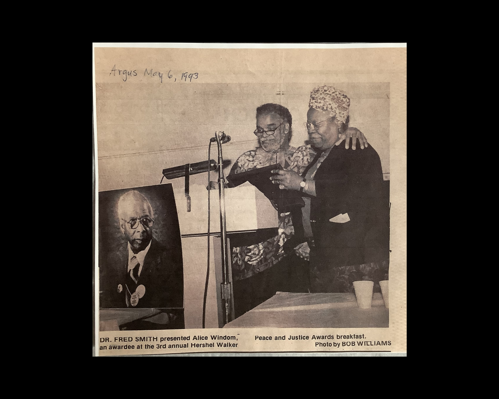 News clipping of image of Alice Windom and Dr. Fred Smith.
Caption: Dr. Fred Smith presents Alice Windom an award at the 3rd annual Herschel Walker Awards.
