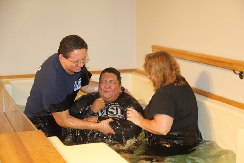 The first baptism in the new baptismal of GCC's new St Charles building