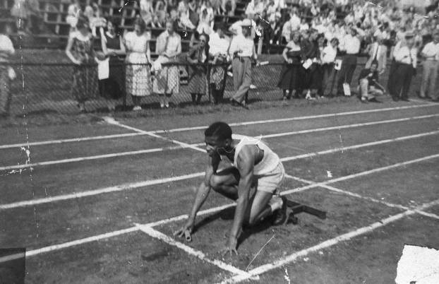 Man Getting Ready to Run A Track Race