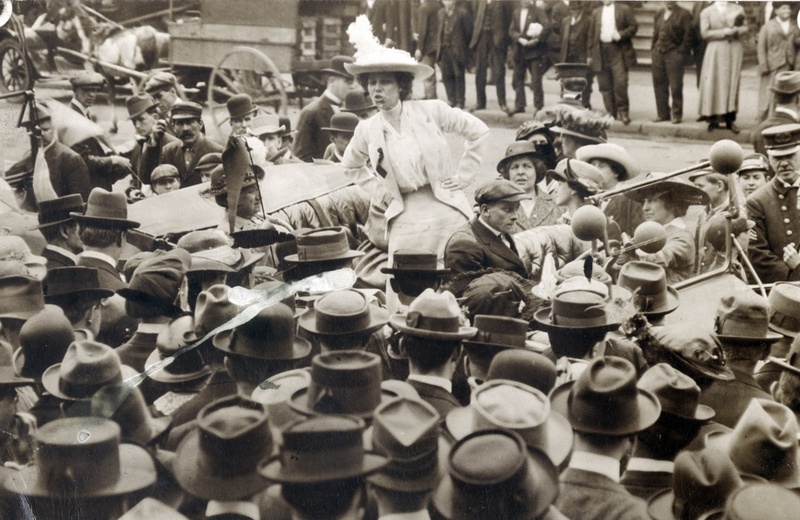 Photograph of Kate Richards O'Hare Addressing Crowd in front of St. Louis Courthouse on National Women's Suffrage Day