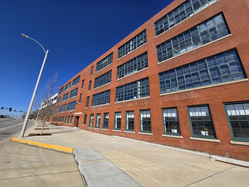 Wide view of side of KIPP School building.