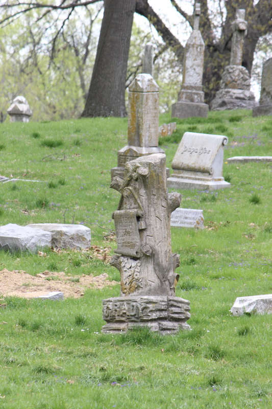 Tree Trunk and Scroll Grave Marker