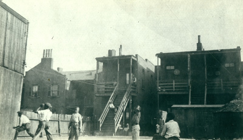Boys Playing in the Back Yard of Homes That Would Be Destroyed in Order to Build Carr Square Village