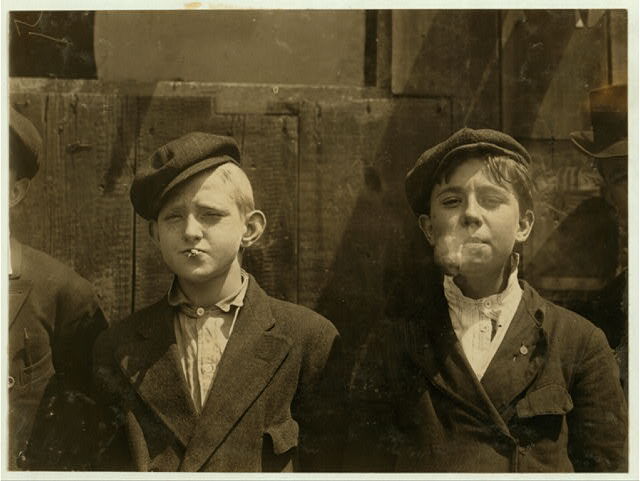 A.M. Mon. May 9, 1910. Newsies at Skeeter's branch They were all smoking. St. Louis, Mo. Location: St. Louis, Missouri.