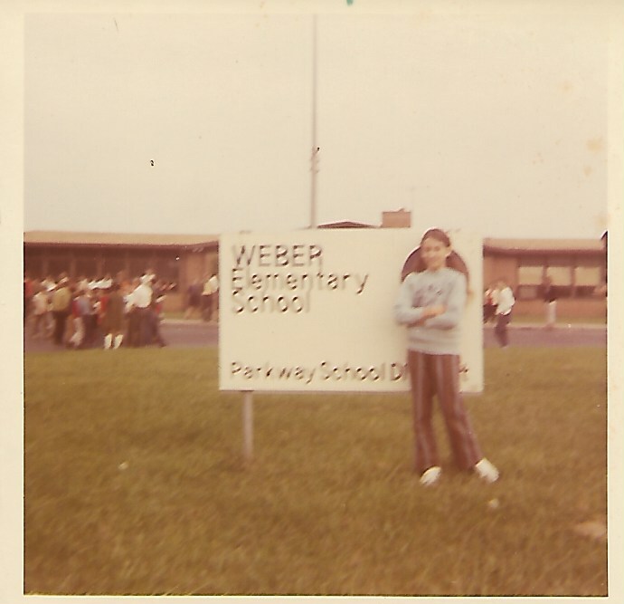 Photograph In Front of Weber Elementary School Sign