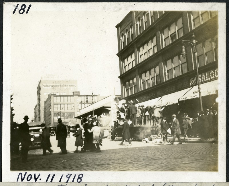 "Armistice Day Truck Load of Negros at 19th & Market Str. N. E. Corner"