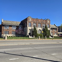 Wide view of the front of the Gallaudet School building.