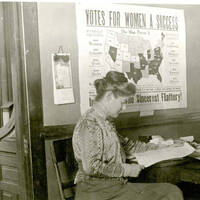 Photograph of Women Seated at Desks.jpg