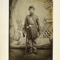UNIDENTIFIED AFRICAN AMERICAN SOLDIER AT BENTON BARRACKS.