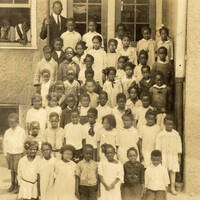Group of Children in Front of Doorway