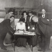 Photograph of Men Signing in Support of Women's Suffrage.jpg