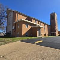 View of front and side of St. Lucas church building.