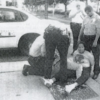 Janey Archey (CAPCR) and JuJu Jacobs (OBS) get handcuffed at scene of convention boycott protest.