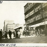"ARMISTICE DAY TRUCK LOAD OF NEGROS AT 19TH & MARKET STR. N. E. CORNER"