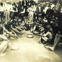 Igorot children surrounded by fairgoers.jpg