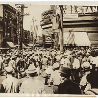 CROWD STOPPING STREETCARS AT COLLINSVILLE AVENUE AND BROADWAY DURING THE EAST ST. LOUIS RACE RIOTS